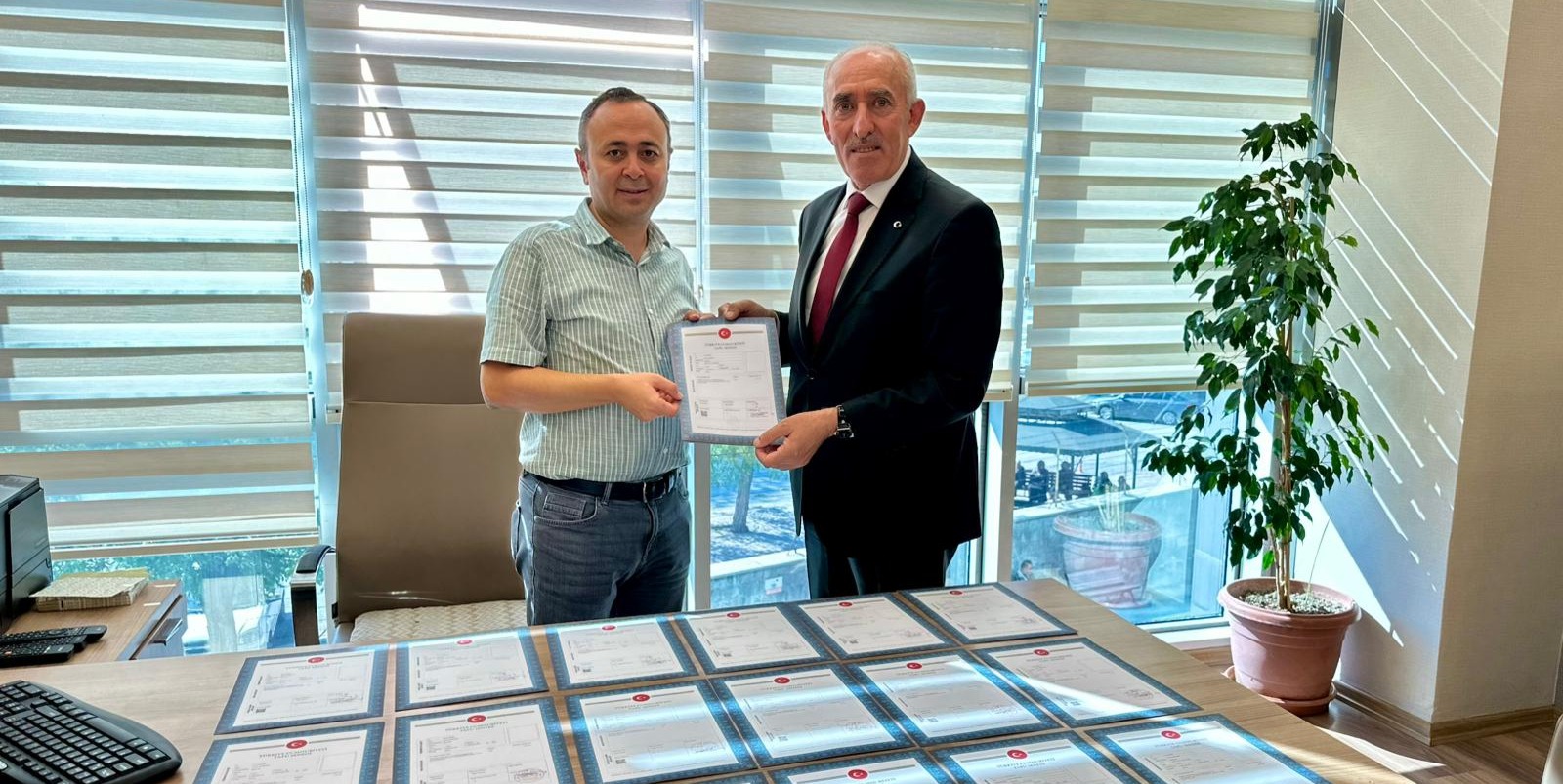 KESOB’un konut projesinde arsaların tapuları alındı